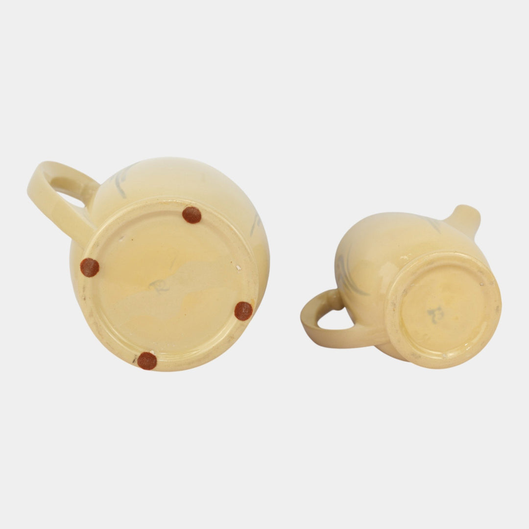 Roseville Pottery Utility Ware Lilies of the Valley Small And Larger Pitcher