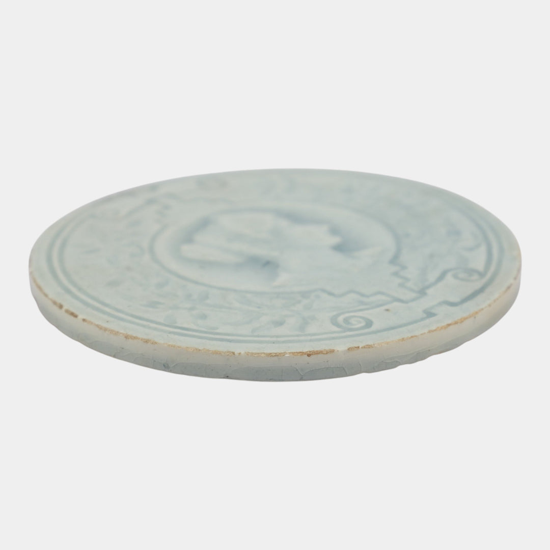 J And JG Low Art Tile Works Art Pottery Light Blue Portrait Round Ceramic Tile